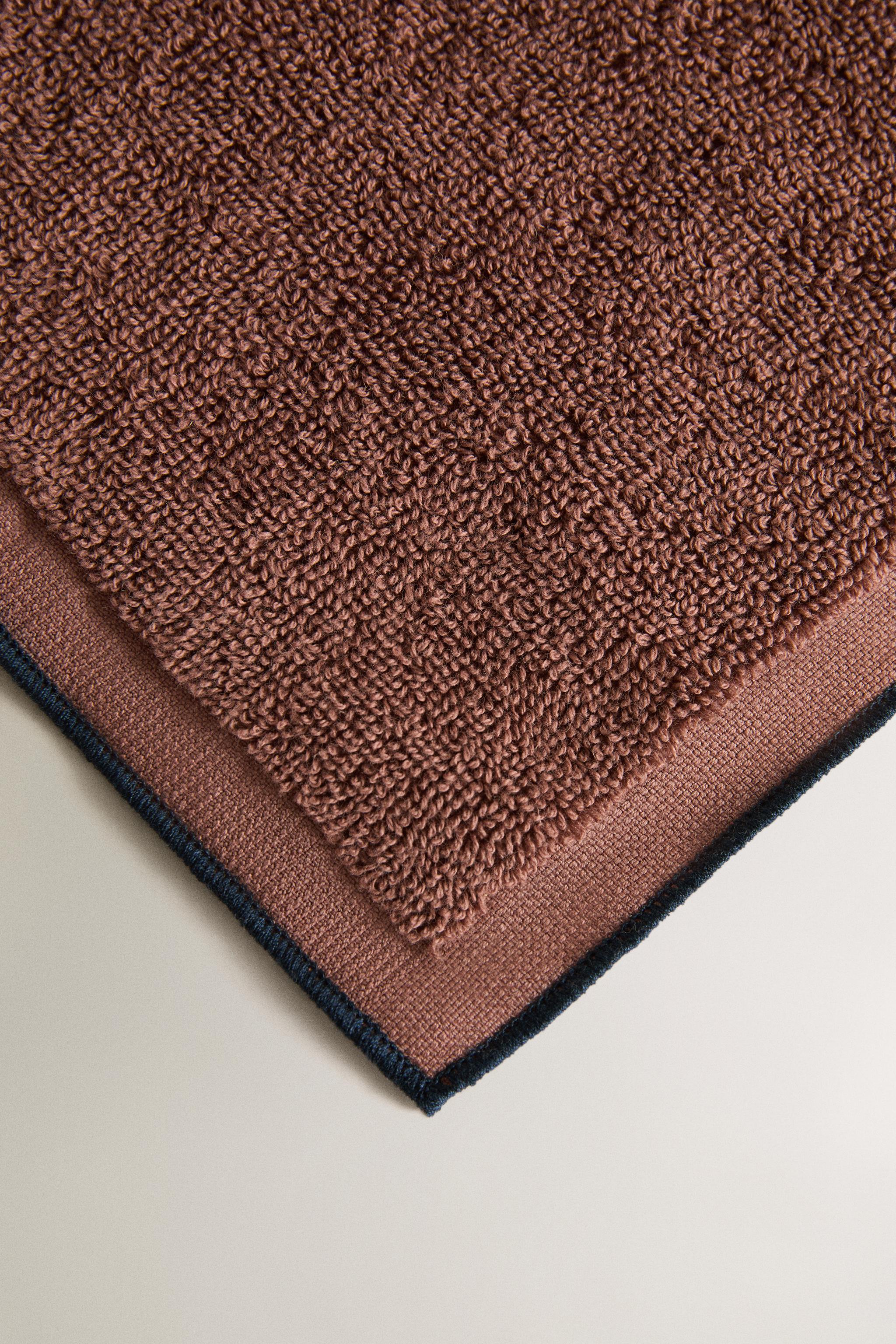 COTTON OVERLOCK BATH TOWEL